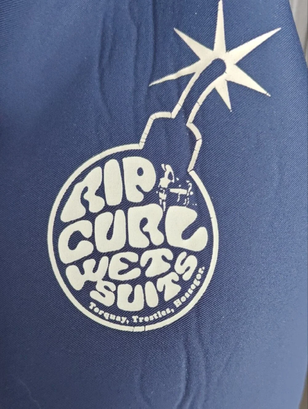 Rip Curl Women's 3/2 Wetsuit In Navy Blue with Patterned Cuffs.